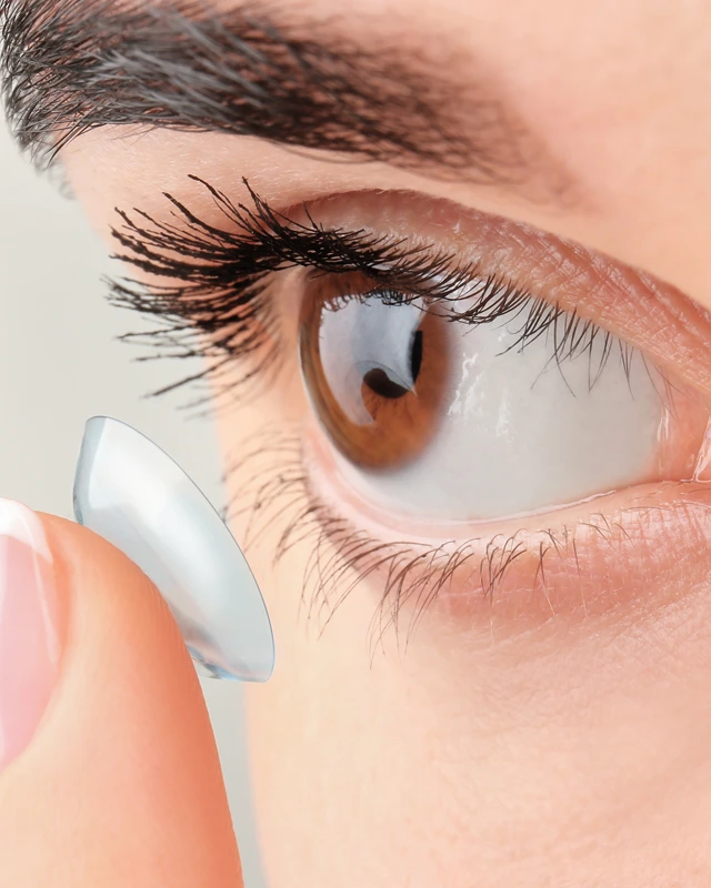Closeup Of Eye Preparing For Contact Lens Insertion