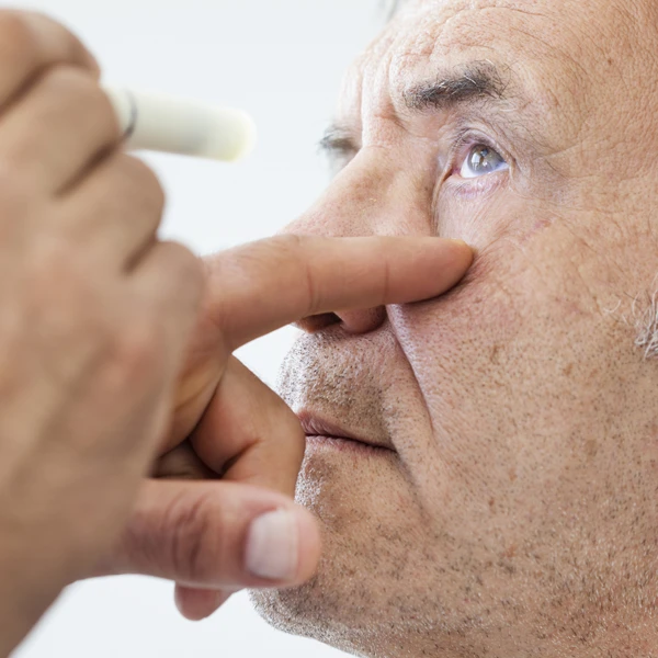 Patient Undergoing Eye Pressure Screening Examination