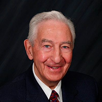 Professional Headshot Of Senior Eye Care Provider